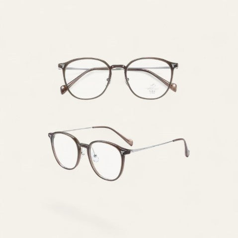 Driftward ultra light blue light blocking glasses with TR90 frame and clear lenses. Round shape, brown tortoise shell effect.