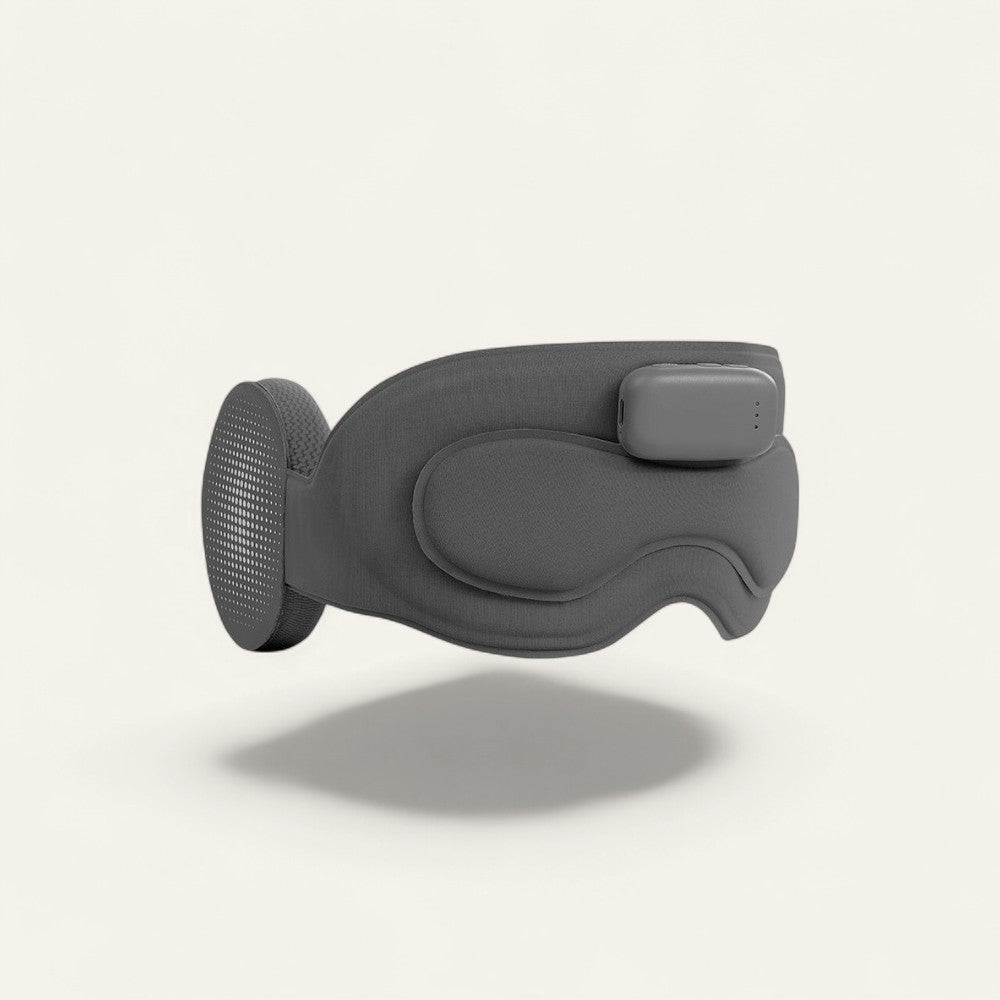 Driftward gray Bluetooth sleep mask with built-in flat speakers for comfortable side sleeping and total light blockage.