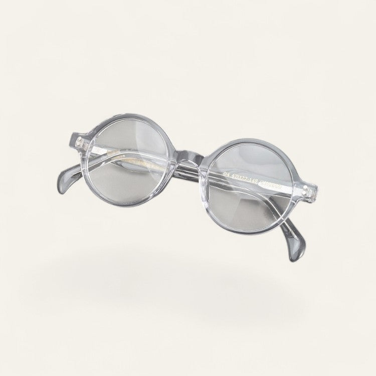 Driftward transparent grey retro round blue light glasses with clear resin frames and anti-blue light lenses.