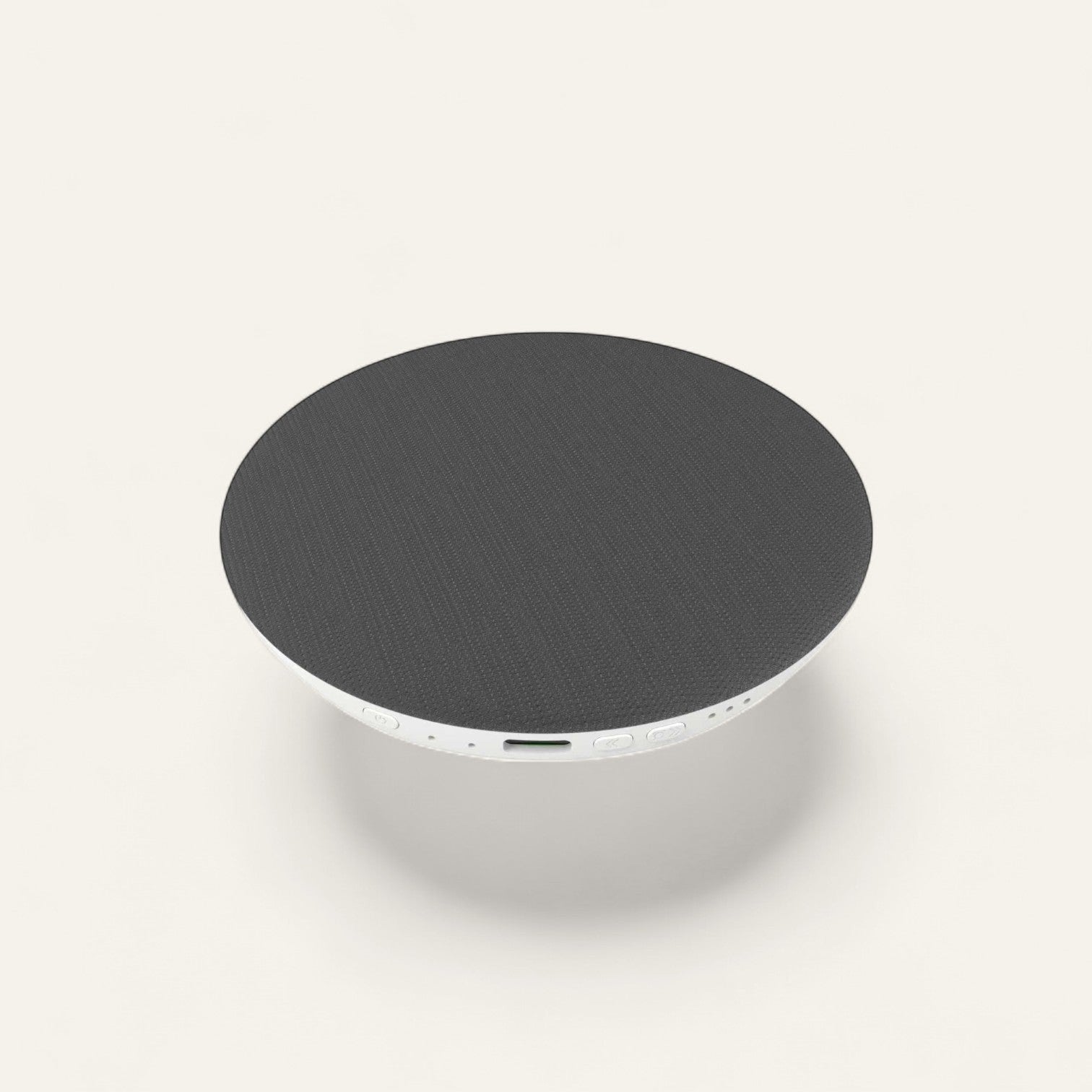 Driftward grey fabric sleep pillow speaker, ultra-thin disc with Bluetooth 5.4 and 20-hour battery.